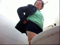 Chubby mature pissing as hidden camera films it
