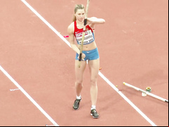 Pole vaulter with a nice butt competes in an event