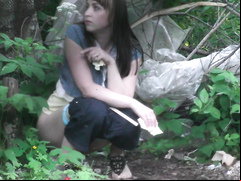 Desperate brunette gets recorded relieving herself in the woods