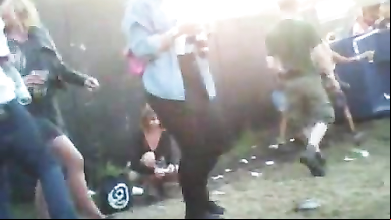 Lots of public pissing at a music festival